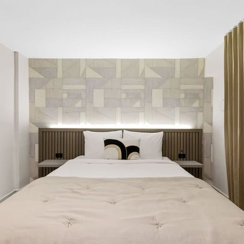 Neutral color palette creates a calming and serene atmosphere.