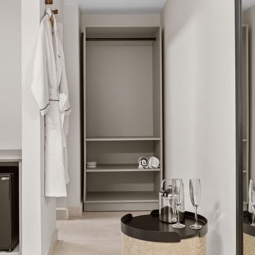 Subtle pattern complements the room's minimalist design.