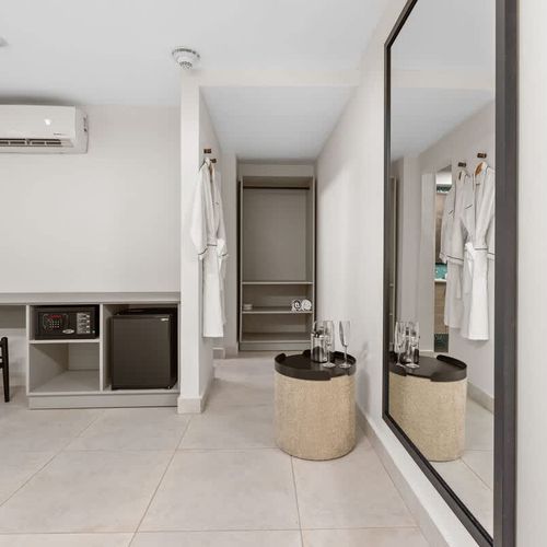 Neutral color scheme creates a calming backdrop for the room.