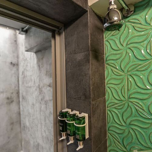 Refreshing rainfall showerhead for a spa-like experience.