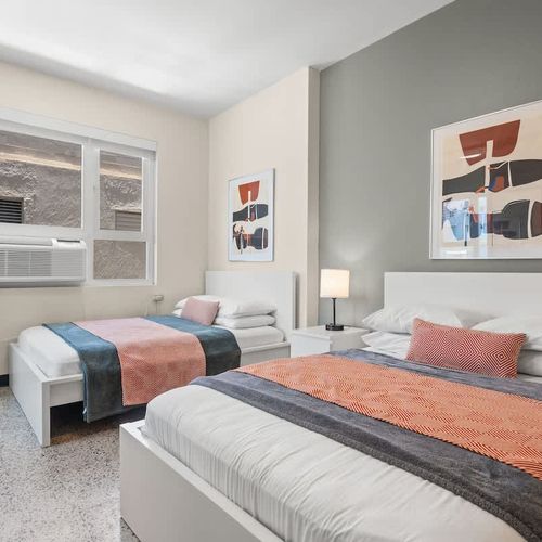 Unwind in a serene setting! This comfortable bedroom is thoughtfully decorated to provide a calming ambiance, ensuring a peaceful and enjoyable stay.