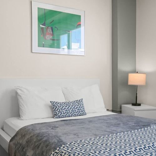 Everything you need for a fresh start. This well-maintained bathroom features a neat layout, plenty of towels, and a clean environment for your comfort.