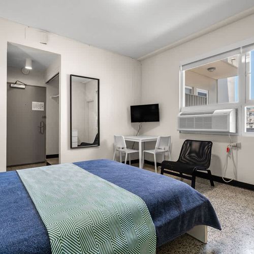 Cozy up in bed and enjoy entertainment on demand in your private bedroom.