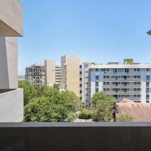 Private Balcony View. Enjoy fresh air and the urban vista of San Juan.