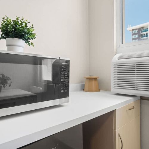 Prepare light meals or snacks with ease in your personal kitchenette.