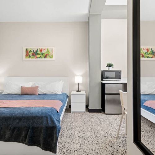 Sink into pure comfort on our luxurious bed, complete with plenty of soft pillows. Every detail is designed for your ultimate relaxation and a perfect night's sleep.