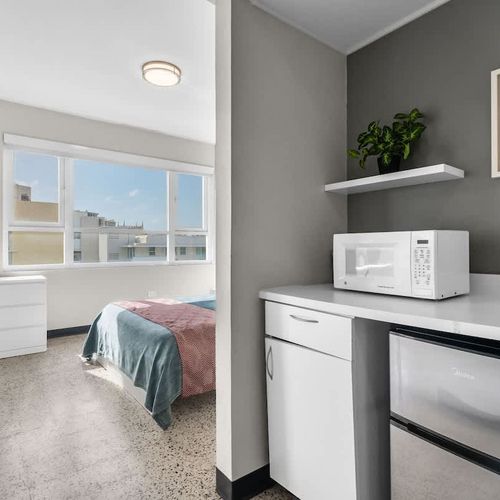 Enjoy the ease of having a microwave and mini-fridge right in your room, perfect for keeping snacks and drinks cool or warming up a quick bite.
