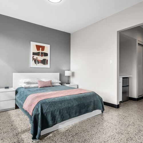 Whether you're traveling for business or pleasure, this room offers a dedicated desk area, providing a quiet spot for productivity or personal planning.