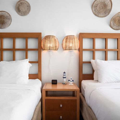 A spacious bedroom with two comfortable beds, ideal for shared comfort and relaxation.