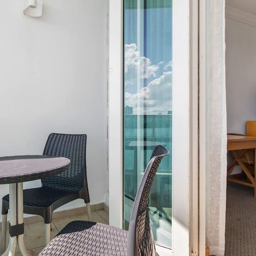 Enjoy a cup of coffee as you take in the breathtaking views from your private balcony.