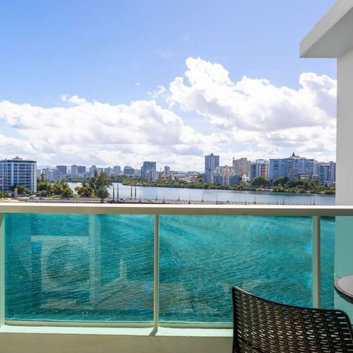 Serenity unfolds where the balcony meets the endless blue horizon.