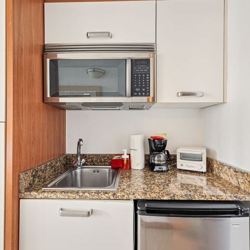 This kitchen is ready for your culinary creations, with everything you need to feel at home.