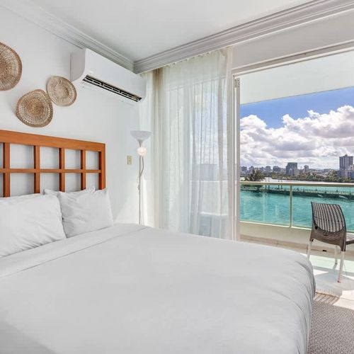Wake up to the soothing sound of the waves, with your bedroom just a step away from the beach view balcony.