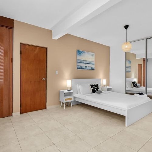 Soft lighting, warm tones—pure bedroom bliss.