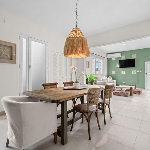 Thoughtfully designed dining area with natural, bohemian touches.