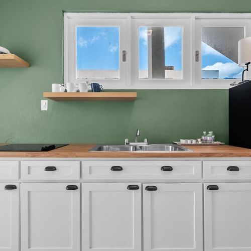 Prepare a meal with ease in this well-equipped kitchen.