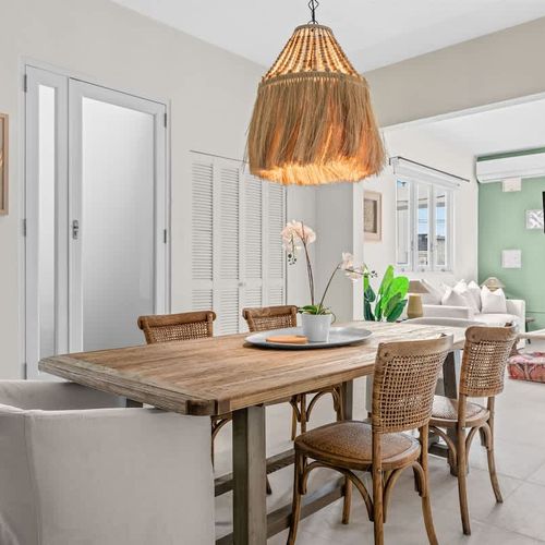 A chic, well-appointed dining area with a view.