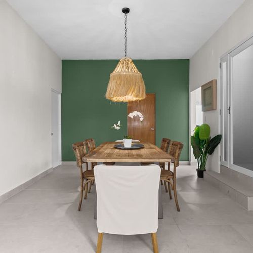 Enjoy a meal at this intimate, well-lit dining nook.