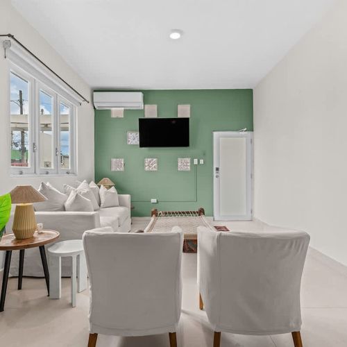 Kick back and watch your favorite shows on a large flat-screen TV.