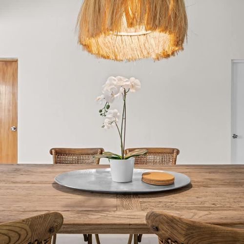 Enjoy your morning coffee at this charming dining table.