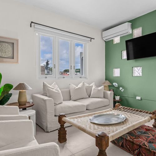 Spacious, bright living area for lounging and socializing.