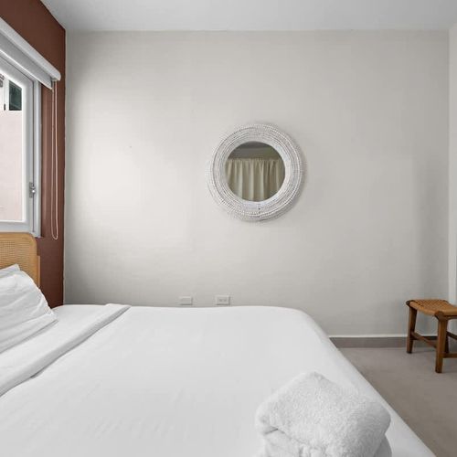 Drift off to sleep in a cozy, pristine bed.