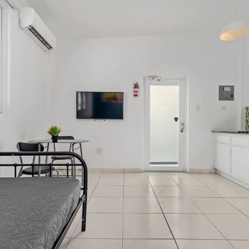 A bright and functional living area. Great for watching TV or simply relaxing.