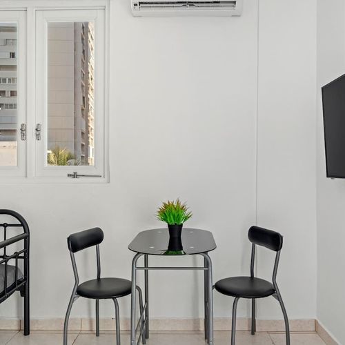 A cozy and intimate dining nook. Ideal for enjoying coffee or a small meal.