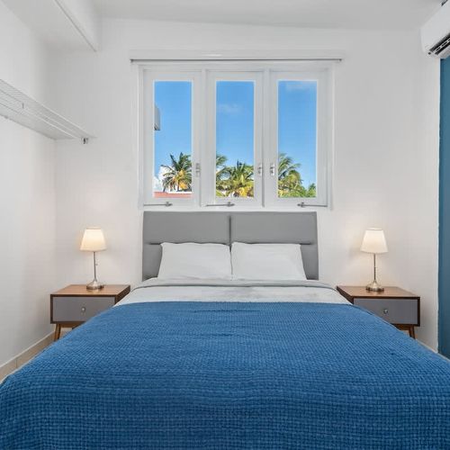 A restful retreat awaits. This main bedroom is designed for ultimate comfort and relaxation.