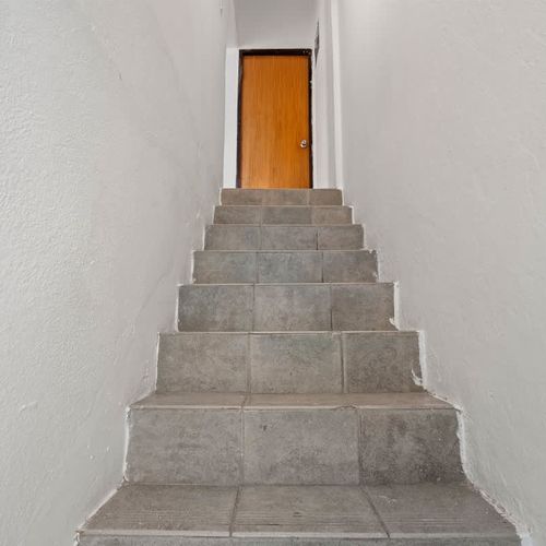 Access your private room via this staircase.