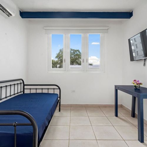 A simple and inviting room for your stay.