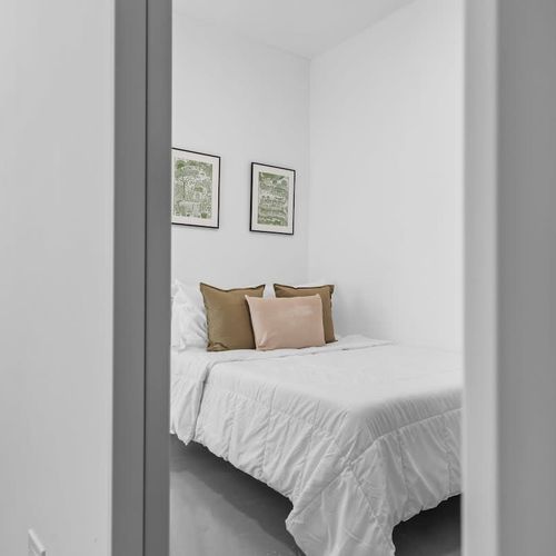 Tranquil guest room with artistic touches