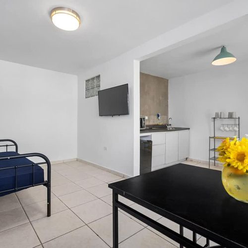 Discover the perfect blend of style and functionality in this well-lit studio apartment, offering a comfortable and practical living space.