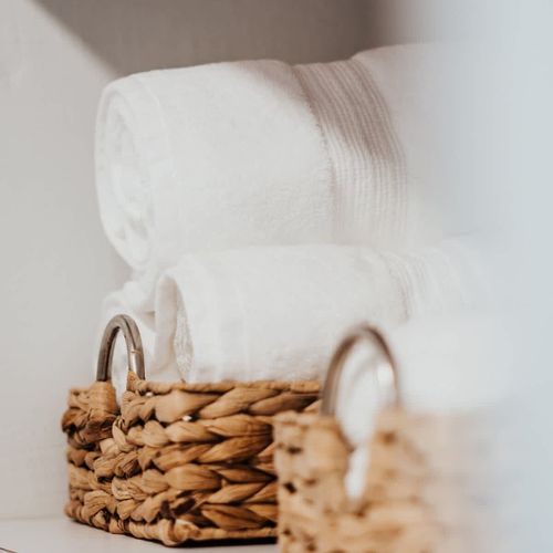 Fresh towels and a clean, minimalist design ensure a refreshing and rejuvenating experience.