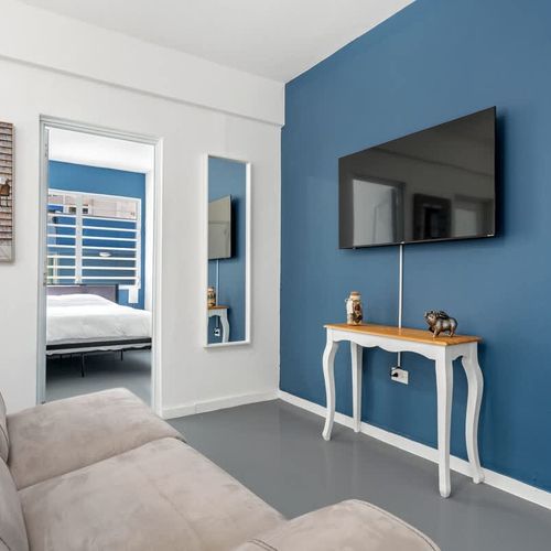 Unwind in a space where minimalist design meets comfort, offering you a perfect place to relax after exploring the city.