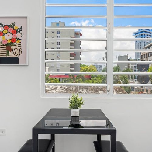 Savor your morning coffee in this cozy space, bathed in natural light, creating the perfect setting to start your day.