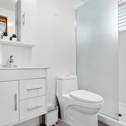 Fresh & functional. A bright, modern bathroom with everything you need to refresh and reset.