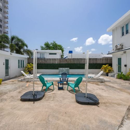 Your private oasis! Relax and sunbathe by the inviting pool.