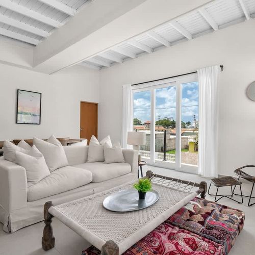 Seamless indoor-outdoor flow. Bright and inviting living area.