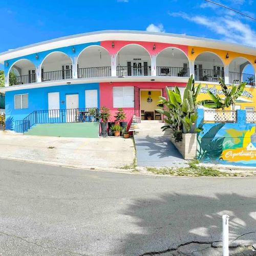 Experience the charm of local architecture with a modern twist. Our beautiful blue building stands out,