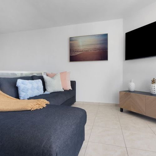 Discover comfort and charm in our beautifully appointed living space. Perfect for unwinding, this room offers a cozy ambiance for your relaxation.