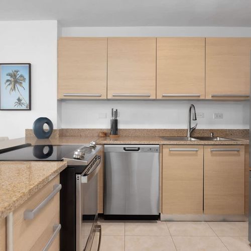 Cook with ease in our well-appointed kitchen. Featuring modern appliances and ample counter space, it's perfect for preparing everything from quick snacks to gourmet meals.