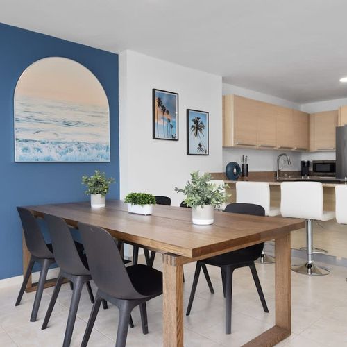 Enjoy the seamless flow of our living spaces. This bright kitchen and dining area are perfect for preparing delicious meals and enjoying them with loved ones.