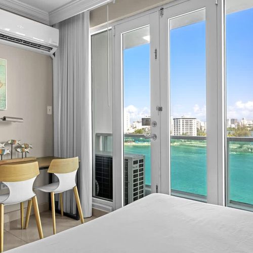 Enjoy unparalleled water views from your private balcony, offering a constant refreshing breeze and a picturesque backdrop for your stay.