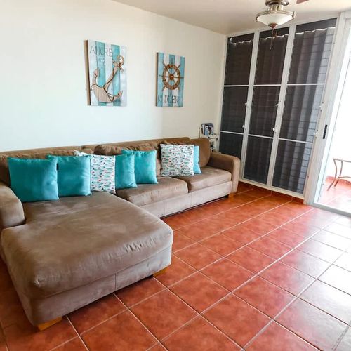 A home is where the sofa gives you a hug.