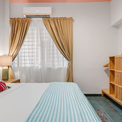 Modern bedroom with stylish accents and a comfortable mattress to ensure deep sleep.