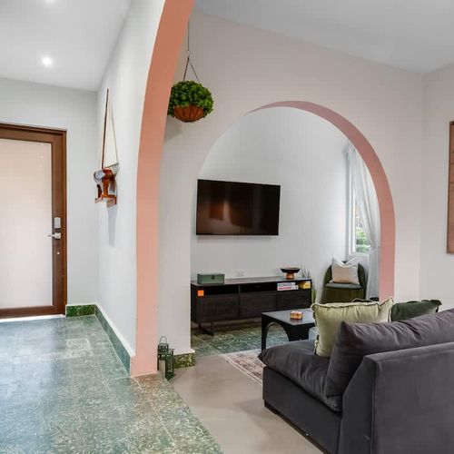 Comfortable living area with a flat-screen TV and plenty of room to unwind after a busy day.