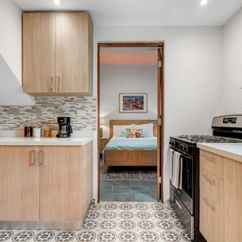 Fully equipped kitchen with modern appliances.