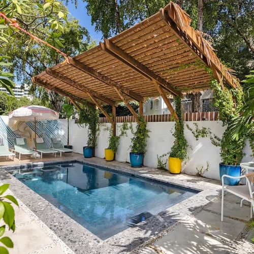 Lounge poolside with a cocktail and soak up the sunshine.