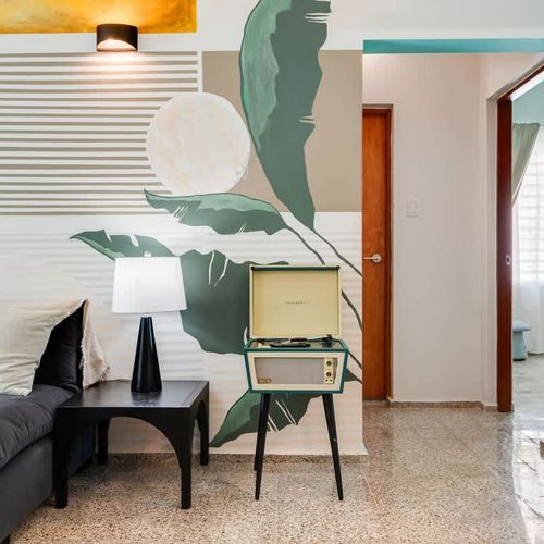 Sink into comfort in this inviting living space, perfect for unwinding or enjoying a movie night.